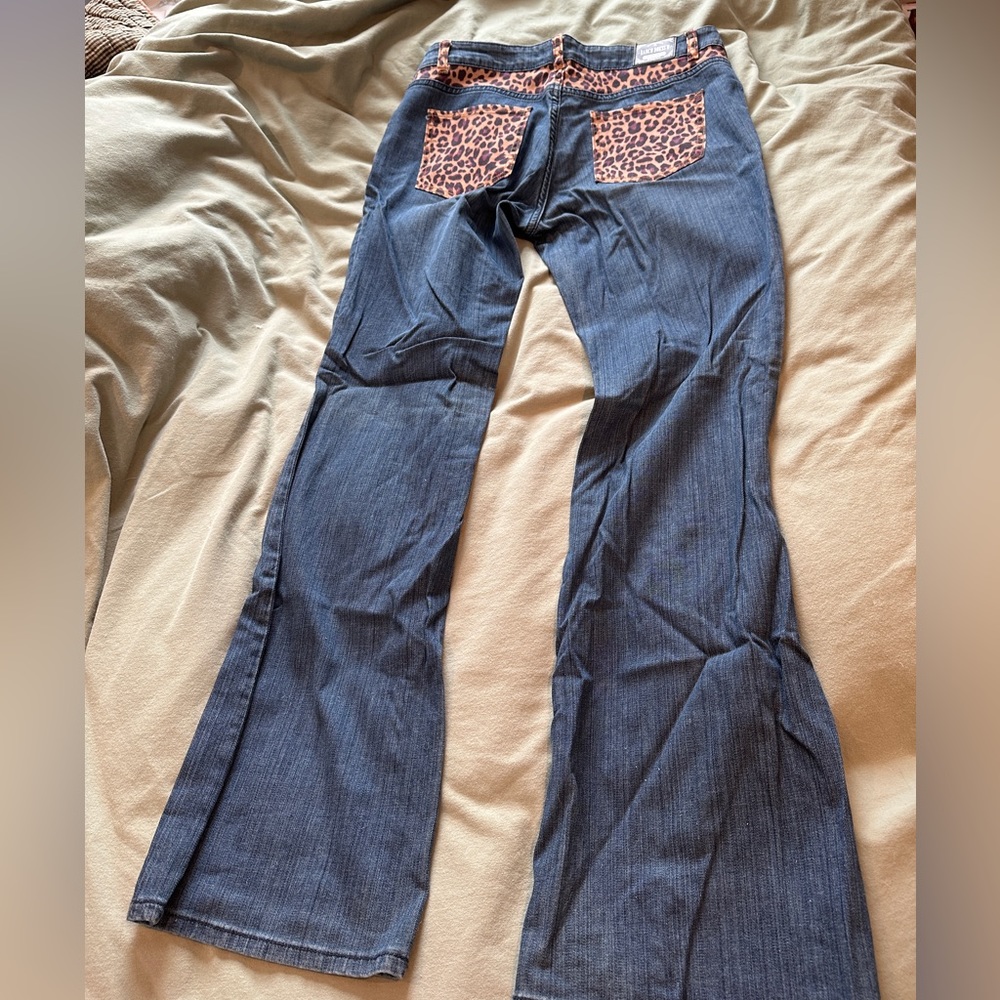 Ranch Dress’n leopard print jeans. Size 12 fit true to size. 34” length.